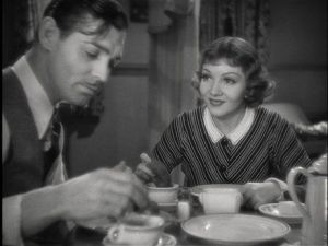 he's teaching her how to dunk her donut properly because she can't even do that right